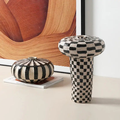 Tall black and white geometric check ceramic vase with rounded mushroom-shaped top for living room decorbites geometric check decor