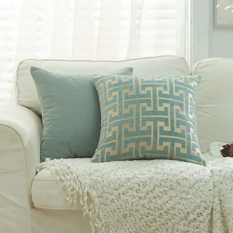 A square teal and cream decorbites geometric chenille throw pillowcase with textured fabric for living room decor