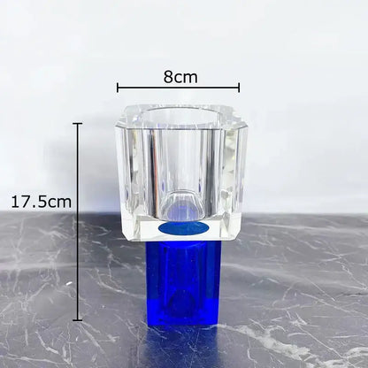 Clear crystal glass vase with faceted octagonal top and cobalt blue base featuring artificial flowers decorbites crystal glass