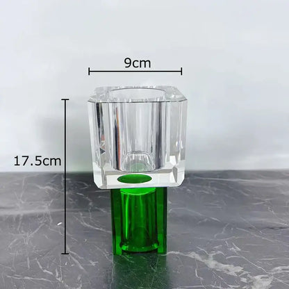 Clear faceted crystal glass vase with green base featuring artificial flowers for modern living room decorbites decor