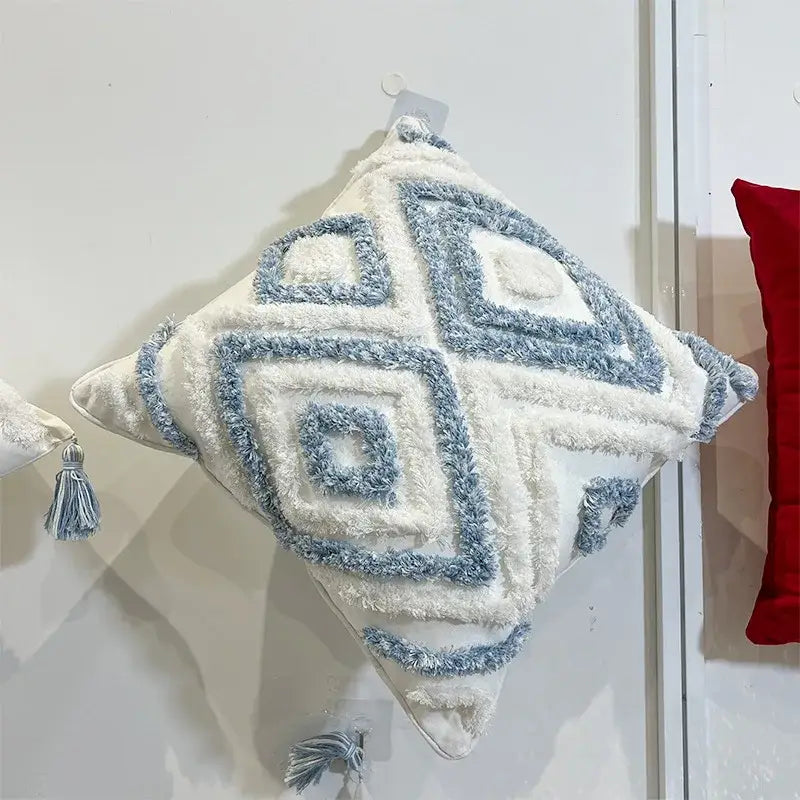 A plush geometric diamond tufted embroidery pillow in blue and white with a textured pattern for living room decorbites geometric diamond