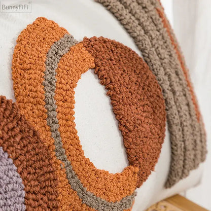Cozy hand-crocheted orange and beige circular cushion cover with chunky knit pattern for home decor by decorbites geometric embroidered