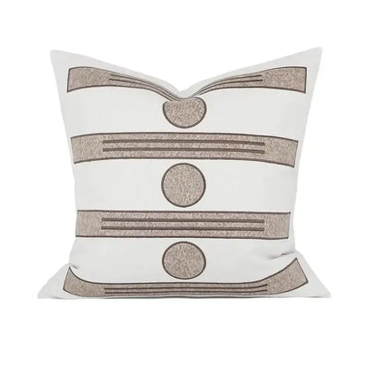 White throw pillow with beige embroidered stripes and circular accents for decorbites geometric embroidered cushion covers