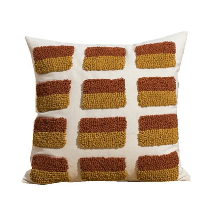 Cream-colored cushion cover with rust and mustard two-tone geometric embroidery circle patches for earthy decorbites decor