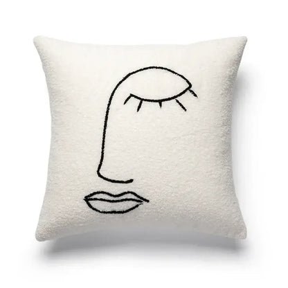 Cream-colored plush cushion cover with minimalist black geometric embroidery decorbites geometric embroidery design