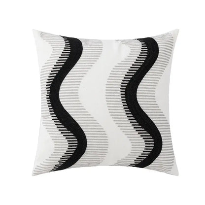 White square cushion cover with bold black wavy embroidery and subtle gray textured lines decorbites geometric embroidery decor