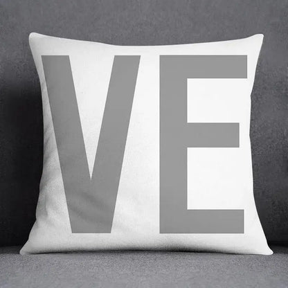 White throw pillow case with bold gray ve lettering featuring decorbites geometric floral print for living room decor