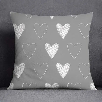 Gray throw pillow case with white chalk-drawn hearts featuring decorbites geometric floral print for living room decor
