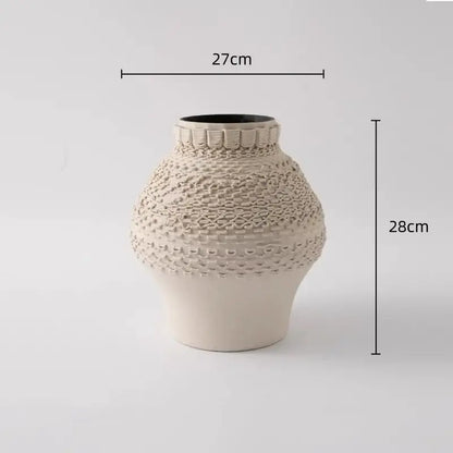 Cream-colored geometric folding ceramic vase with textured woven pattern and scalloped rim for living room decorbites decor