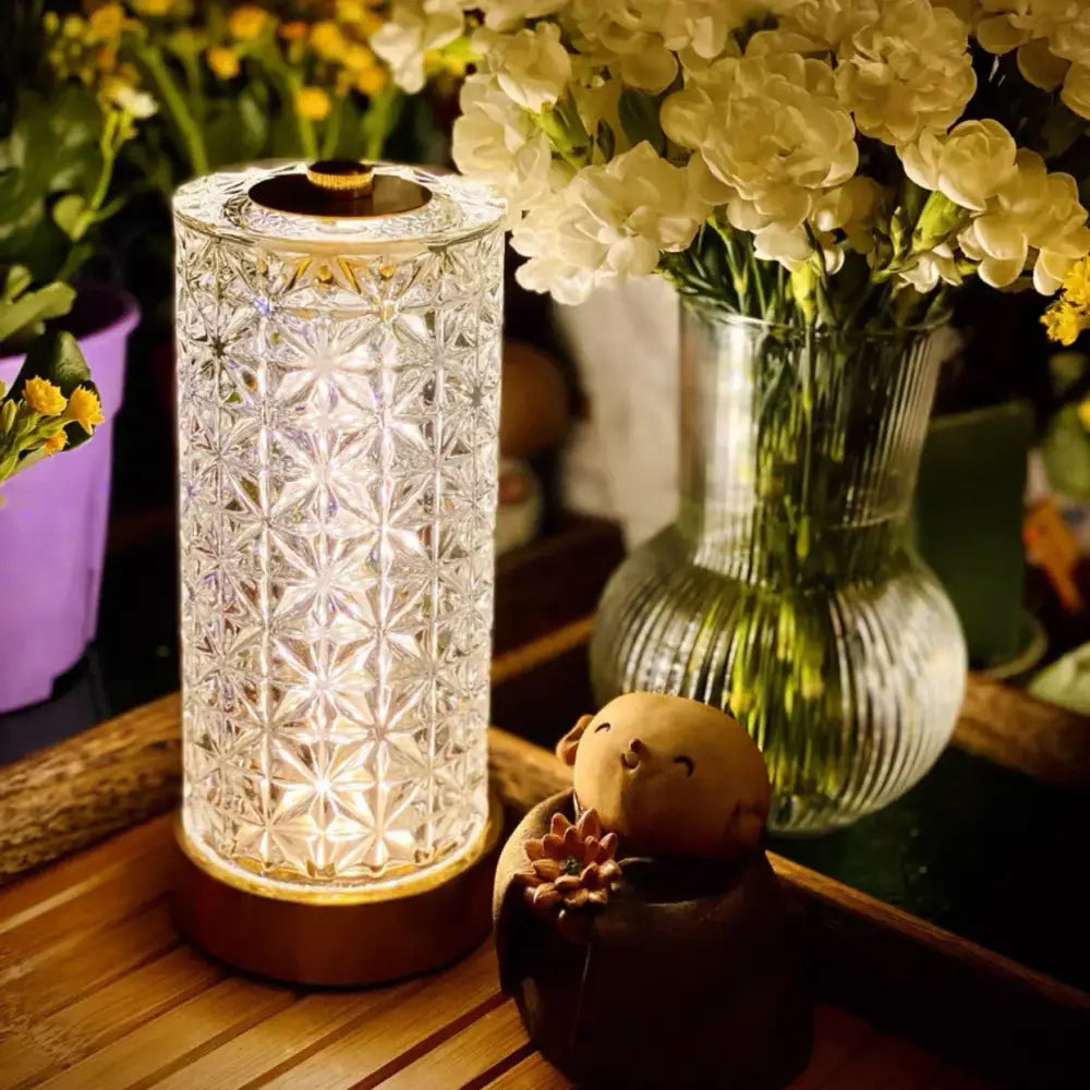 Clear glass crystal table lamp with geometric cut patterns and warm dimmable led light by decorbites crystal table