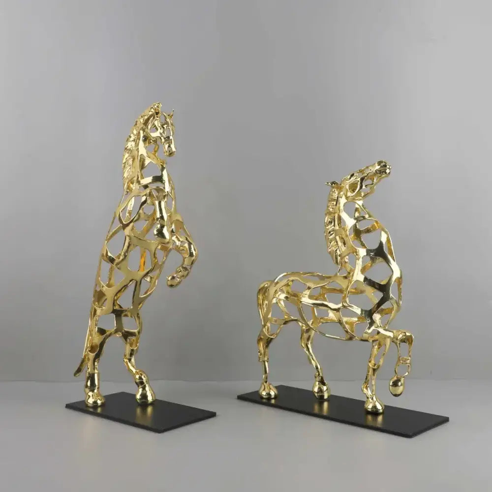 Geometric golden horse metal sculpture with intricate hollow design and black base for living room decorbites golden horse decor