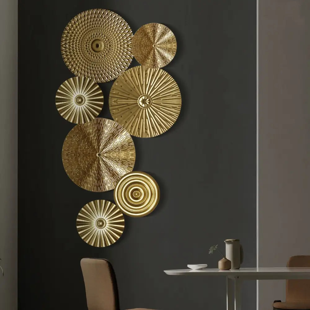 Set of seven gold-toned geometric golden metal circular wall art pieces with intricate patterns for living room decorbites decor