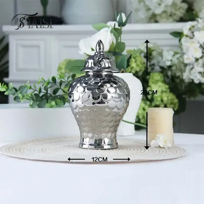 Shiny silver ceramic porcelain jar with scalloped textured surface and lid from decorbites geometric golden collection