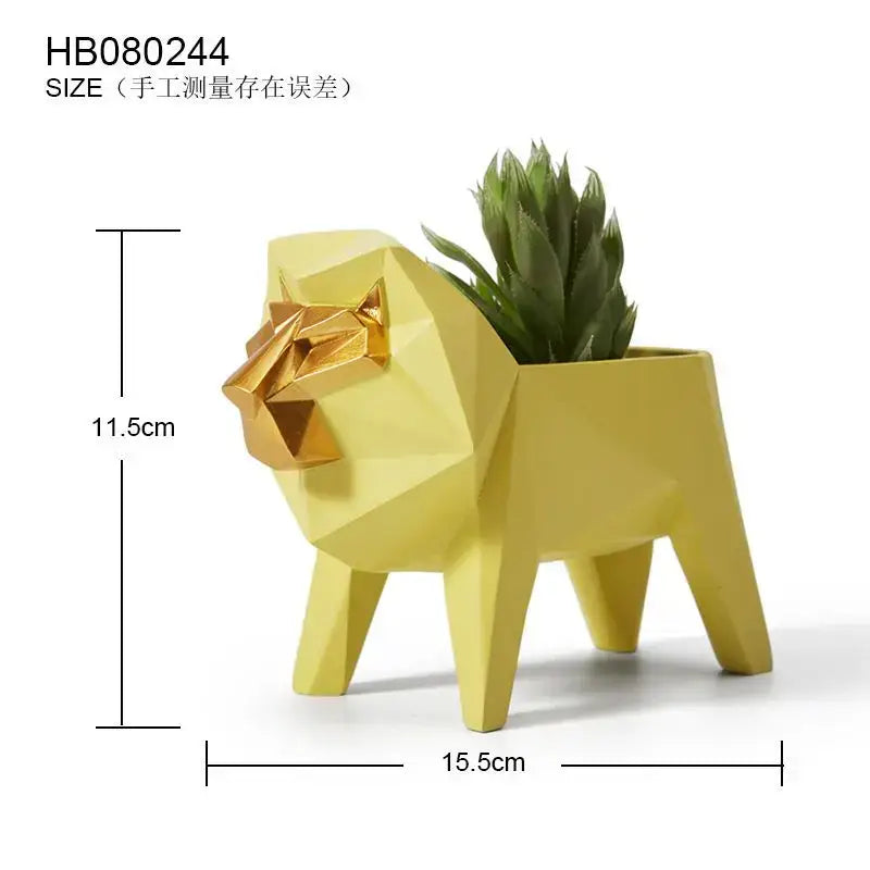 Yellow geometric lion planter with gold face and green succulent inside complementing decorbites giraffe 3d papercraft sculpture