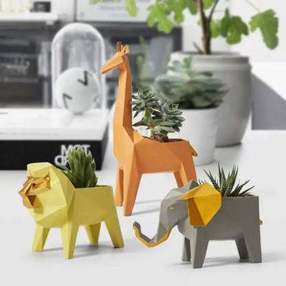 Orange geometric giraffe 3d papercraft planter with succulent decorbites giraffe papercraft sculpture for living room decor