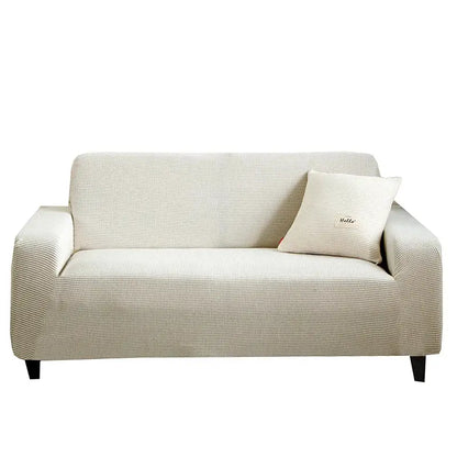Beige textured stretch sofa cover with matching pillow embroidered with hello for living room decor