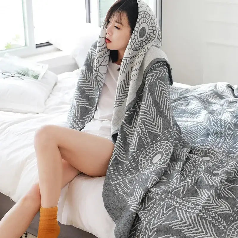 Geometric gray and white decorbites cotton gauze throw blanket with a soft textured weave for bedroom decor
