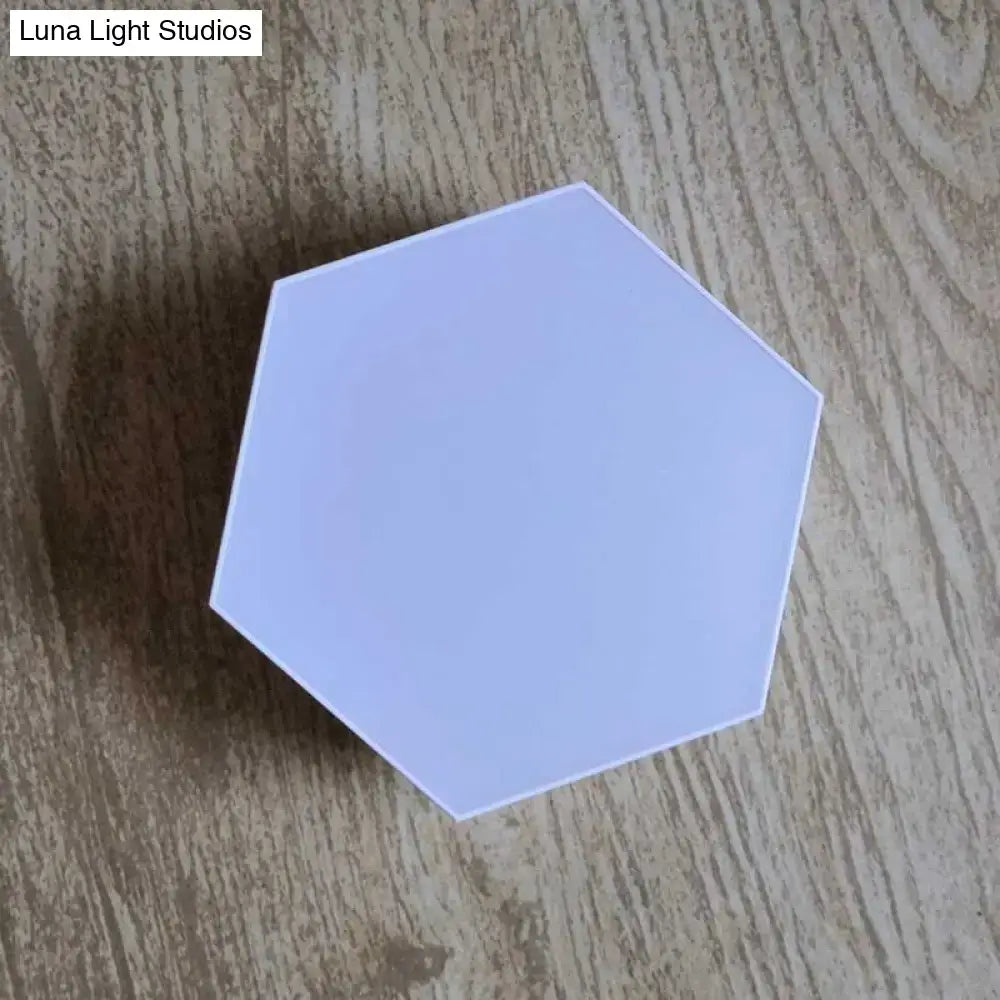 A sleek light blue matte hexagonal acrylic panel for geometric hexagon led wall lights with bluetooth app control