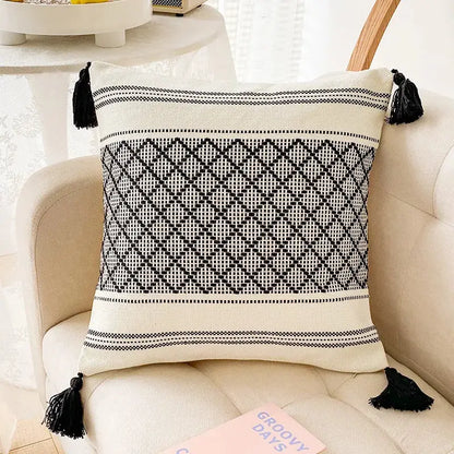 Cream-colored cushion cover with black geometric embroidery and tassels for decorbites blue diamond jacquard decor