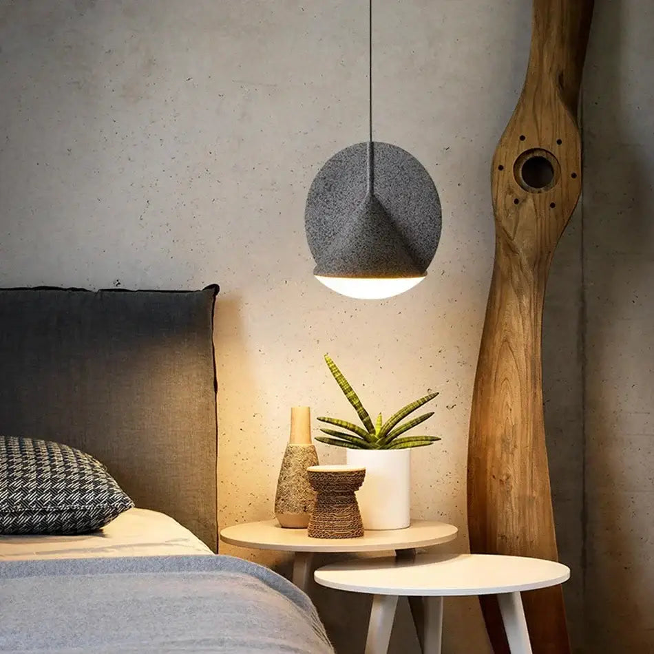 A modern gray pendant lamp with textured fabric shade in matte copper and charcoal gray for kitchen decorbites colorful led