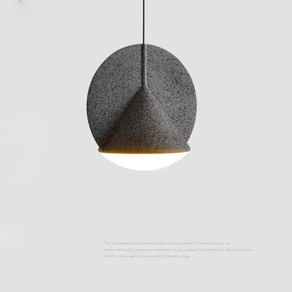 A modern pendant lamp with a textured dark gray shade and white illuminated base for decorbites colorful led ceiling