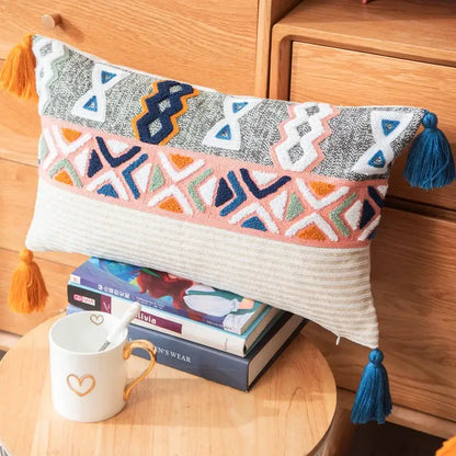 Rectangular embroidered cushion cover with multicolor geometric pattern and tassels for living room decor