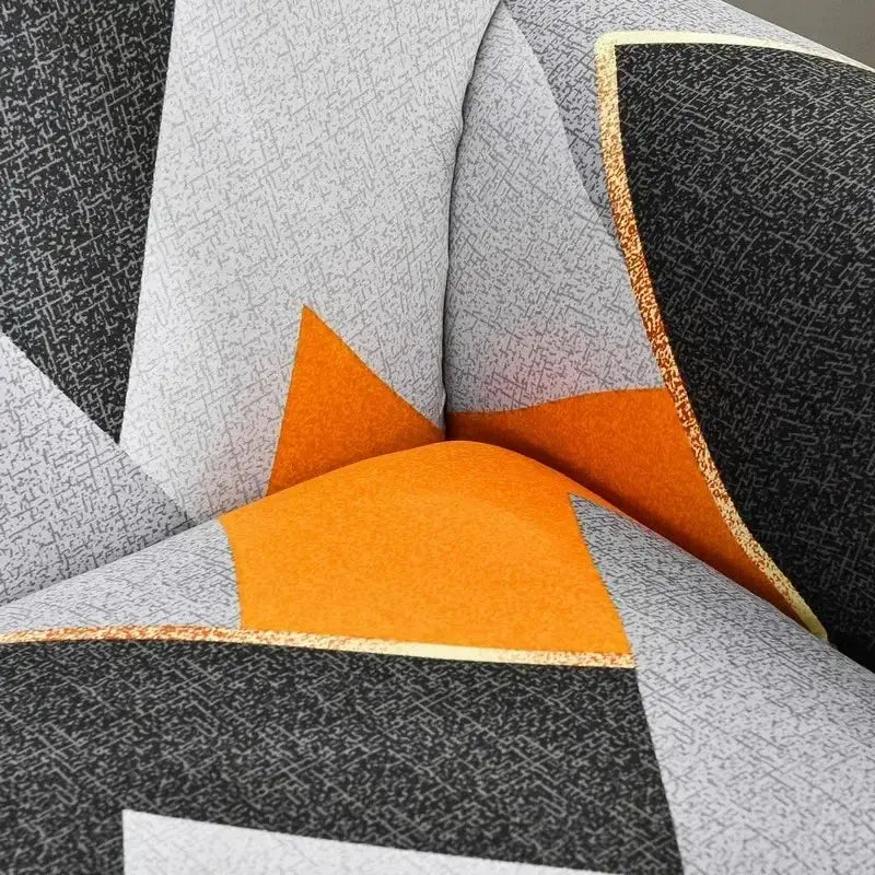 Modern geometric-patterned armchair with decorbites colorful block sofa covers in gray black and vibrant orange fabric