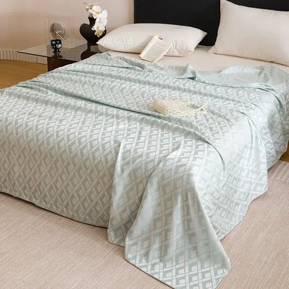 Light blue quilted bedspread with subtle geometric pattern made of decorbites bamboo fiber summer lightweight bedding