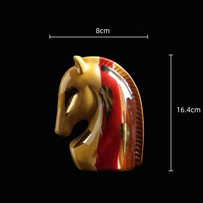 Glossy geometric horse head ceramic vase in red and yellow with detailed mane ridges for living room decor
