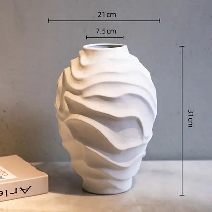A white ceramic geometric spiral vase with wavy texture 31cm tall ideal for fruit platter and home decor