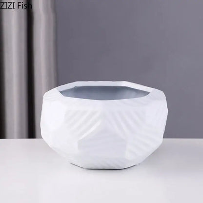 White ceramic vase with faceted geometric design and subtle texture minimalist ceramic vase decorbites ceramic vase