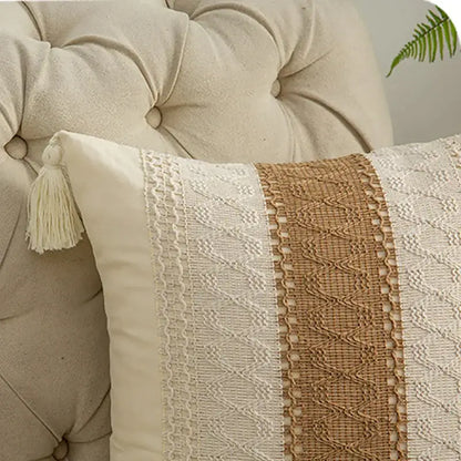 Cream-colored geometric tassel cushion cover with tan woven stripe, white lace, and matching tassel for decorbites decor