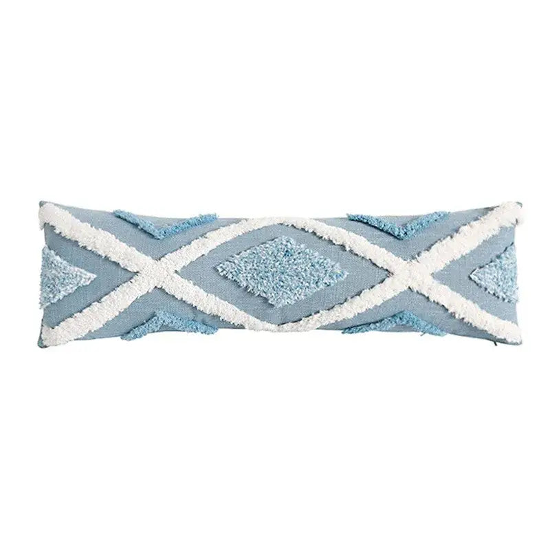 Light blue pillow covers with white geometric tassel tufted star pattern and fringe for living room decor