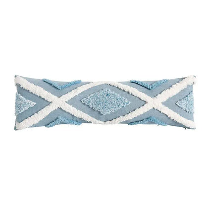 Light blue pillow covers with white geometric tassel tufted star pattern and fringe for living room decor