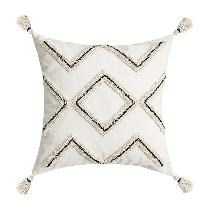 Cream-colored geometric tufted pillow covers with black embroidery and tassels for decorbites living room decor