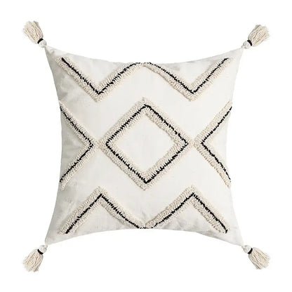 Cream-colored geometric tufted pillow covers with black embroidery and tassels for decorbites living room decor