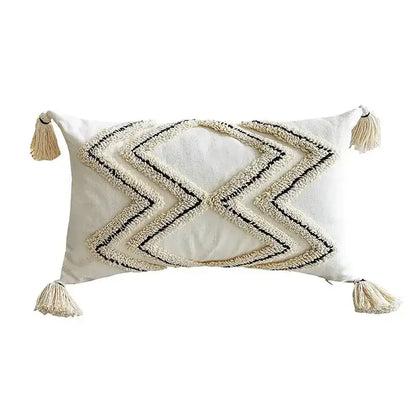 Cream-colored cushion cover with black and cream geometric tufted embroidery and tassels for living room decorbites decor