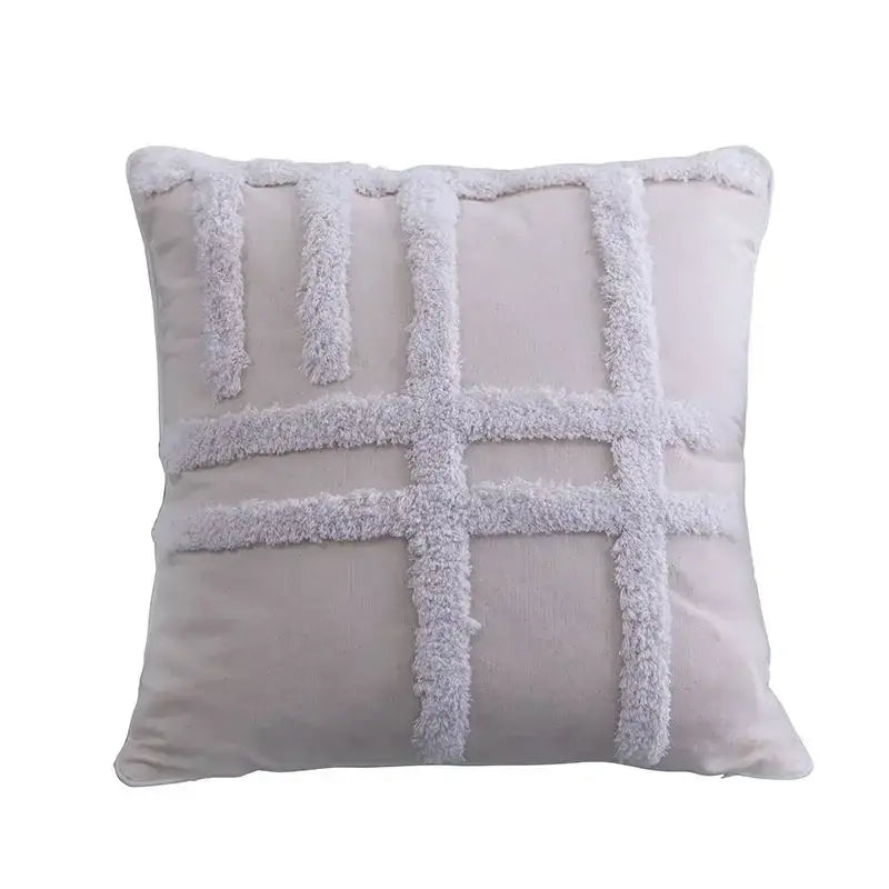 A light gray cushion cover with a geometric tufted fluffy grid pattern for decorbites geometric tufted decor