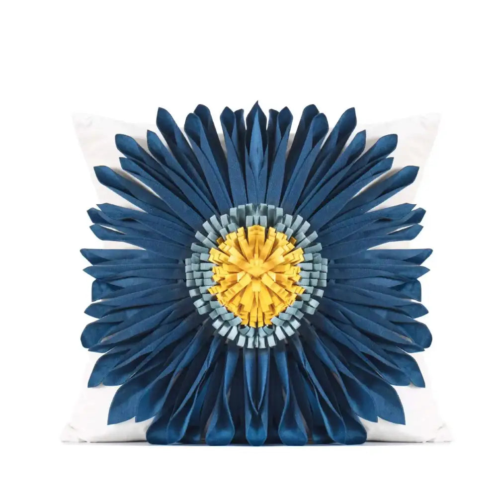 A geometric tufted navy and white cushion cover with a plush blue daisy pillow and vibrant yellow center decorbites geometric tufted