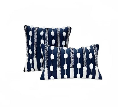 Navy blue and white geometric tufted cushion cover with vertical stripes and tassel decorbites geometric tufted design