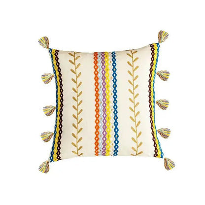 Cream-colored cushion cover with embroidered vertical stripes and multicolored tassels for decorbites geometric tufted decor