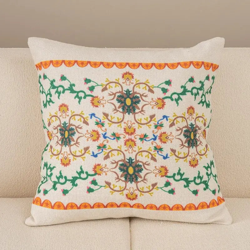 Off-white cushion cover with intricate embroidered floral patterns and scalloped border for decorbites geometric tufted decor