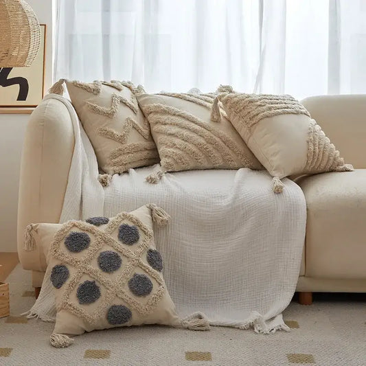 Beige cushion cover with gray circular embroidery and tassel trim decorbites geometric tufted tassel living room decor