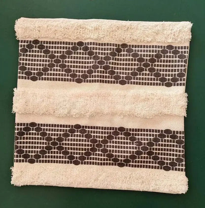 Beige cushion cover with frayed edges and dark brown geometric tufted tassel bands for decorbites geometric decorbites geometric tufted tassel decor
