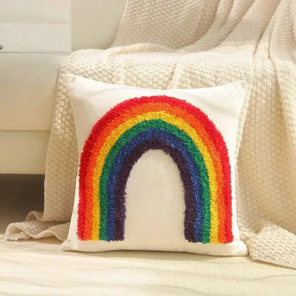 Cozy white cushion cover with vibrant geometric tufted tassel rainbow design in classic hues for decorbites living room decor