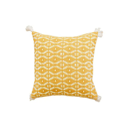 Yellow square cushion cover with white woven geometric pattern and crochet tassels by decorbites for living room decor