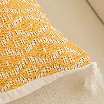 Yellow and white woven cushion cover with textured geometric tufted pattern and crochet tassels for living room decorbites decor