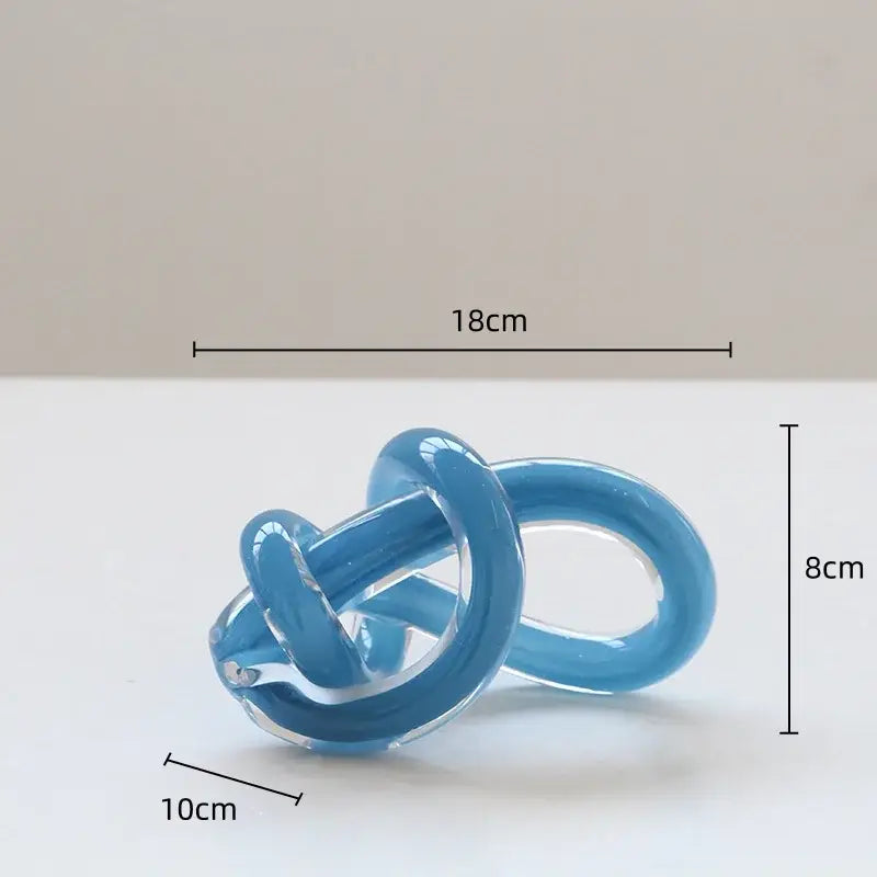 Translucent blue glass twine knot sculpture 18cm long 8cm tall geometric decorbites geometric glass home decor item
