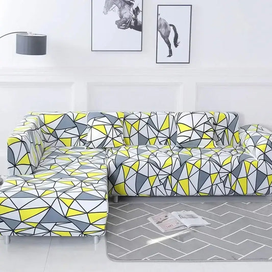 Vibrant geometric stretch sofa cover in bold yellow gray and white tones by decorbites for living room couch protection