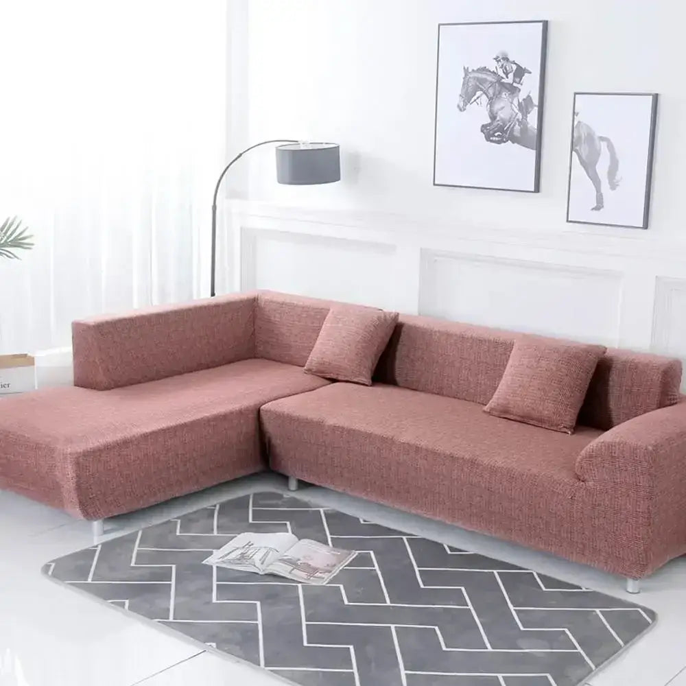 A rust-colored stretchy sofa cover snugly fits an l-shaped sectional couch decorbites geometric stretch sofa